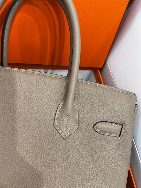  Understated top-handle bag front view 7