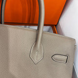  Understated top-handle bag front view 7