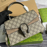 Handle and strap detail of chic polished women's handbag – women's designer-style accessory