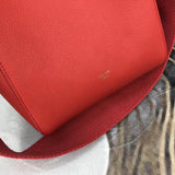 Styled lifestyle shot of statement modern women's handbag – women's statement bag