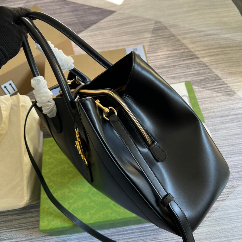Handle and strap detail of structured everyday-luxe women's handbag – women's designer-style accessory