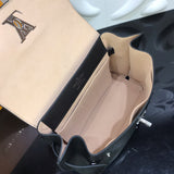 Front view of polished signature women's handbag – women's designer-style accessory