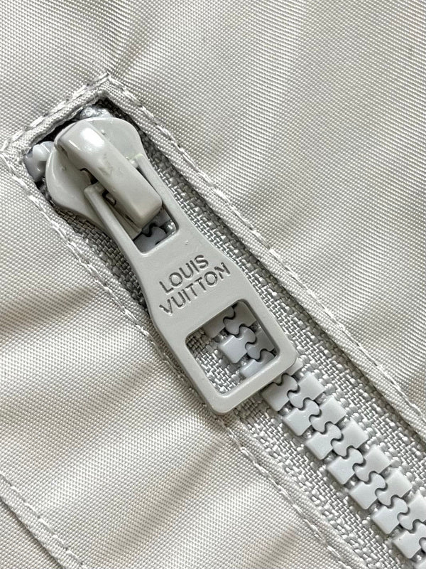 Front view of Louis Vuitton luxury clothing with label-forward styling