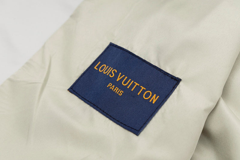 Close-up detail shot of Louis Vuitton luxury clothing with everyday silhouette