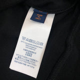 Back view of Louis Vuitton luxury clothing with tailored silhouette