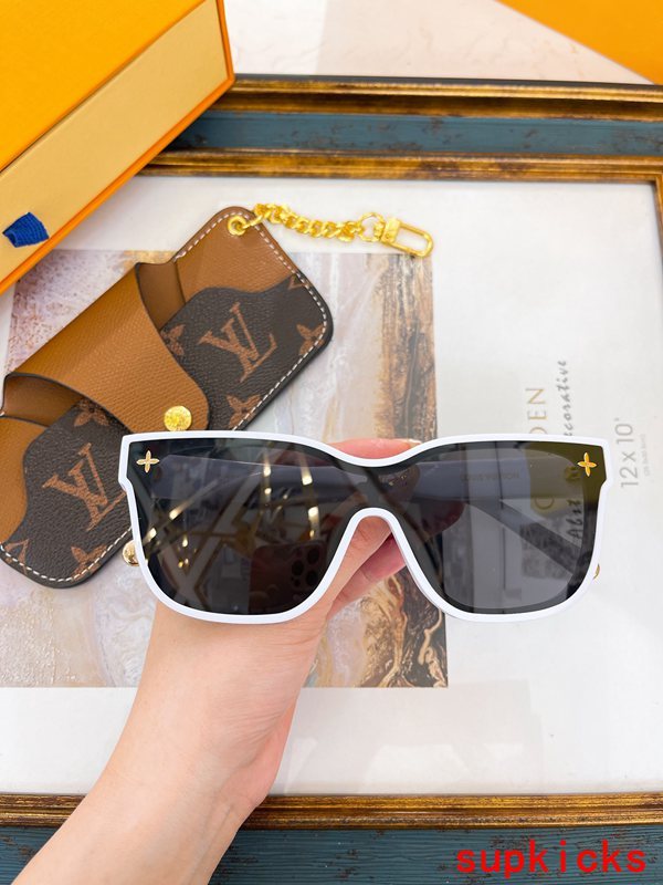 Close-up detail view of Louis Vuitton unisex sunglasses