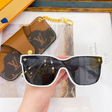 Close-up detail view of Louis Vuitton unisex sunglasses