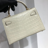 Side view of sophisticated structured handbag