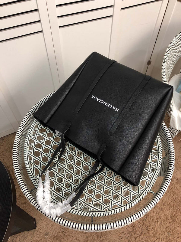 Styled lifestyle shot of sleek premium women's handbag – women's premium purse