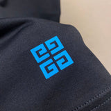 Close-up detail shot of Givenchy luxury clothing with everyday silhouette