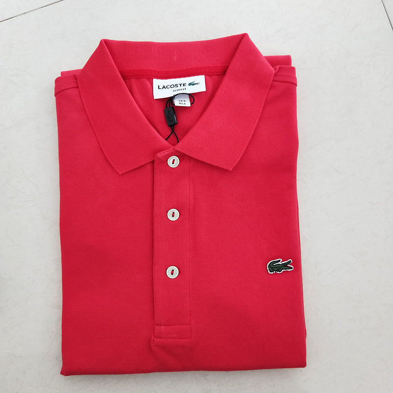 Close-up detail shot of Lacoste luxury clothing with signature branding