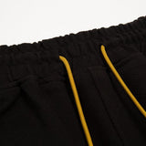 Close-up detail shot of Rhude luxury clothing with contemporary cut