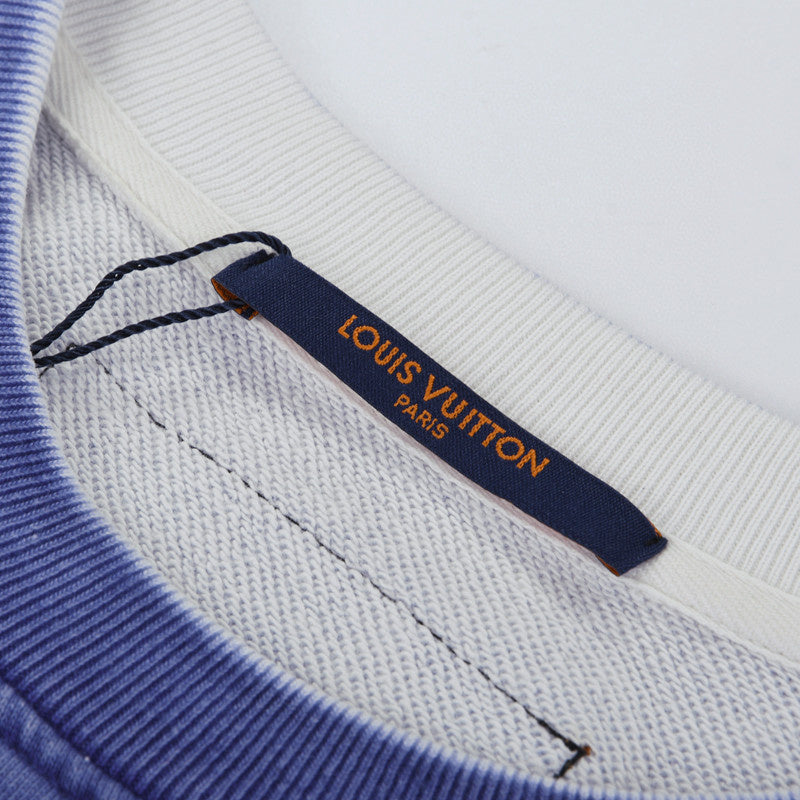 Flat lay presentation of Louis Vuitton luxury clothing with streetwear-inspired cut