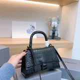 Ziva's Charm handbag – front view (one versatile size)