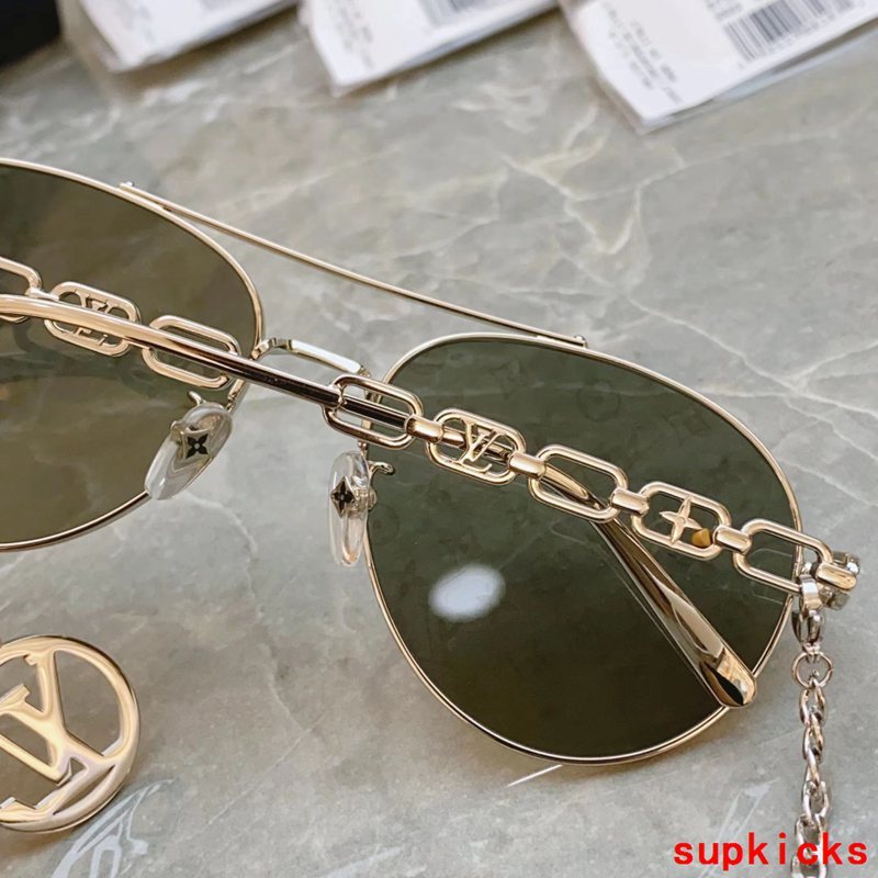 Close-up detail view of Louis Vuitton unisex sunglasses