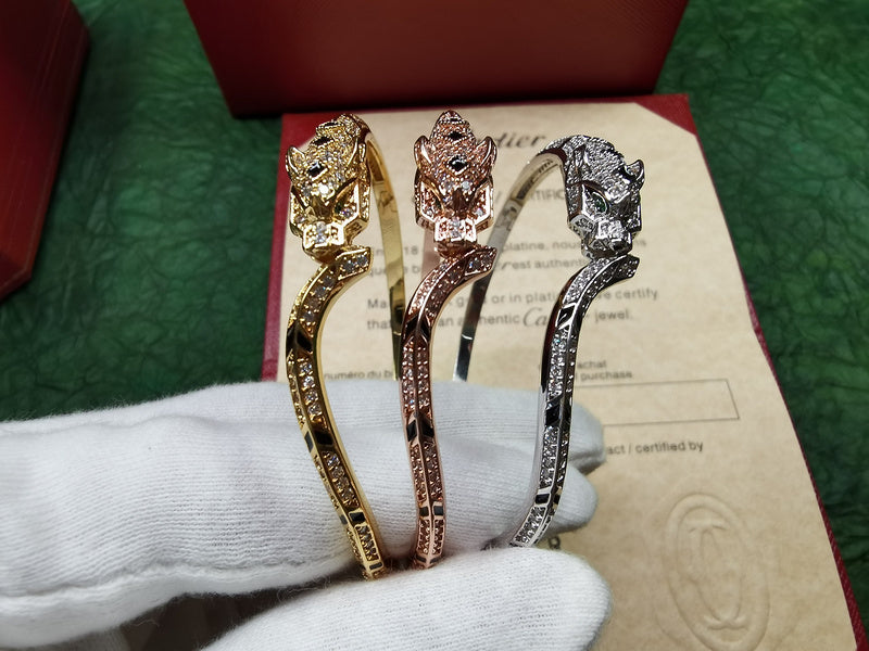 Front view of Cartier unisex jewelry piece