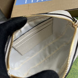 Close-up detail of structured polished women's handbag – women's statement bag