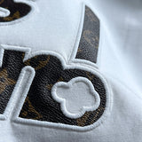Flat lay presentation of Louis Vuitton cotton t-shirt with relaxed-fit cut