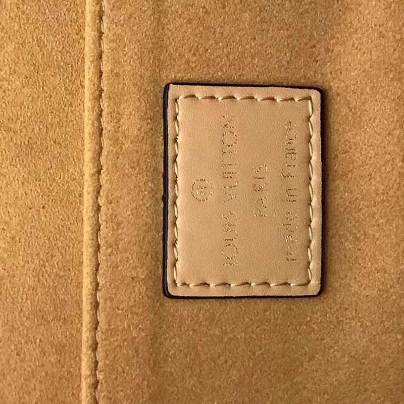 Side profile of refined polished women's handbag – women's everyday handbag