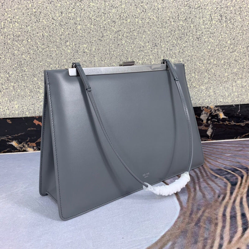 Close-up detail of elevated polished women's handbag – women's statement bag