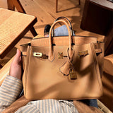  essential top-handle bag detail view showing craftsmanship