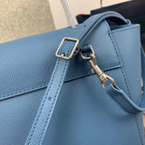 Front view of classic refined women's handbag – women's designer-style accessory