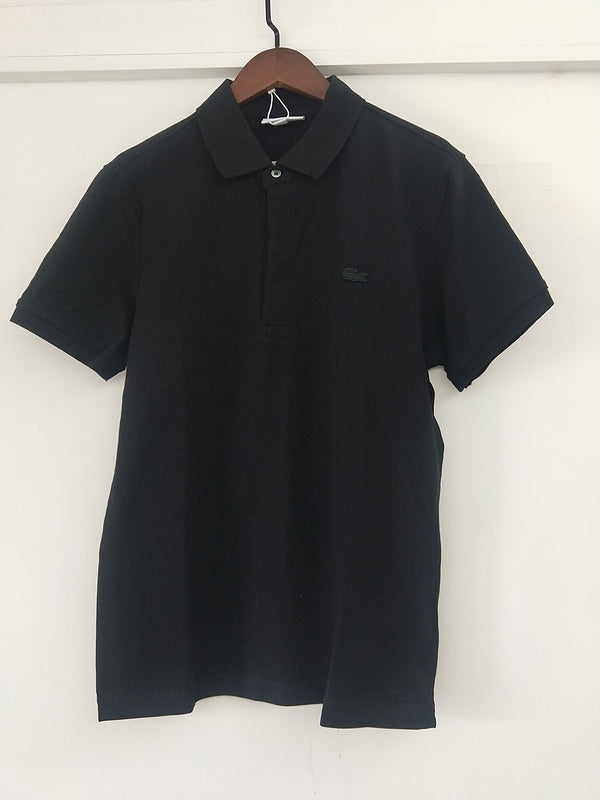 Full styled look of Lacoste luxury clothing with signature branding