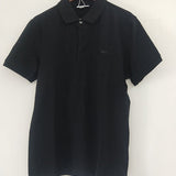 Full styled look of Lacoste luxury clothing with signature branding
