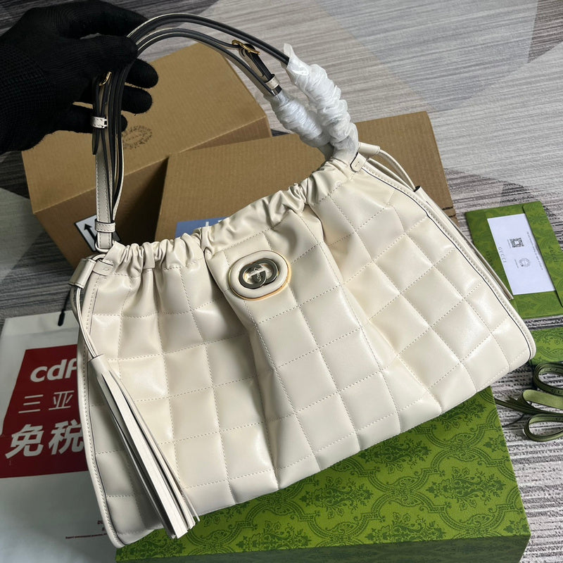 Front view of chic signature women's handbag – women's statement bag