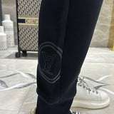 Side profile of Louis Vuitton luxury clothing with everyday silhouette