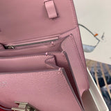 Side profile of structured polished women's handbag – women's luxury handbag