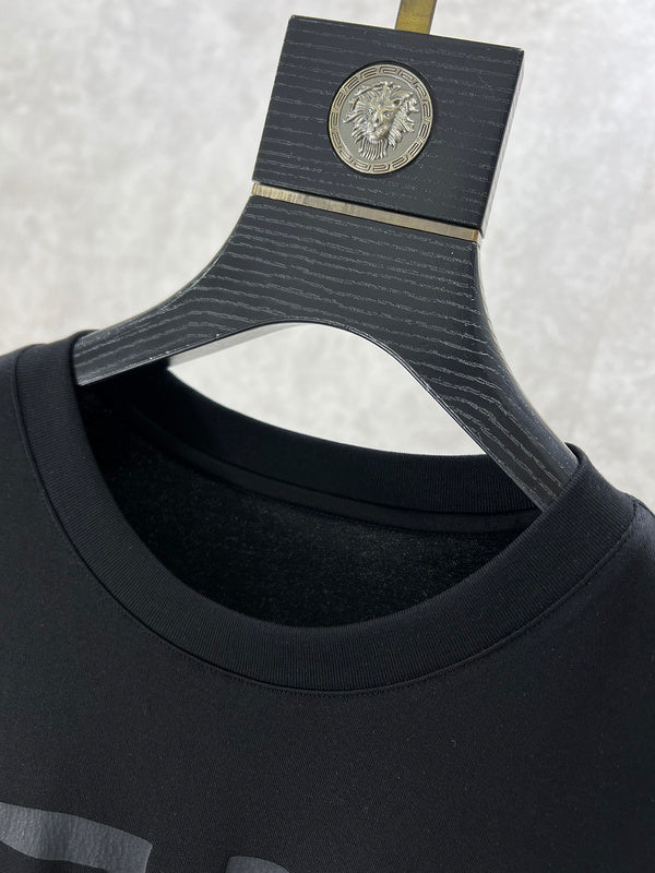Close-up detail shot of Givenchy luxury clothing with everyday silhouette