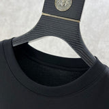 Close-up detail shot of Givenchy luxury clothing with everyday silhouette