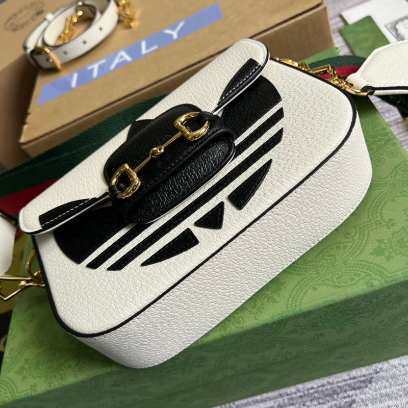 Handle and strap detail of classic sleek women's handbag – women's designer-style accessory