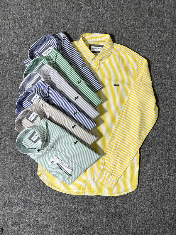 Flat lay presentation of Lacoste luxury clothing with monogram-inspired silhouette
