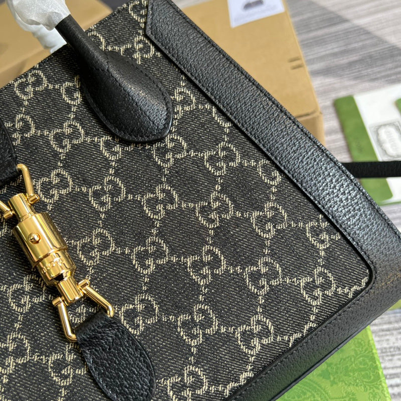 Styled lifestyle shot of signature sleek women's handbag – women's designer-style accessory