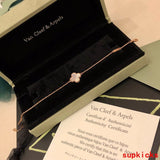 Angled view of Van Cleef & Arpels unisex jewelry piece