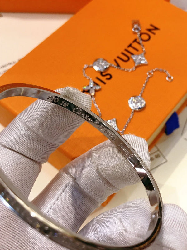Lifestyle view of Cartier unisex jewelry piece