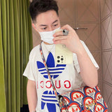Side profile of Gucci luxury clothing with signature branding