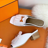 Hermès Burgundy High-Top Sneakers - Sole Detail View