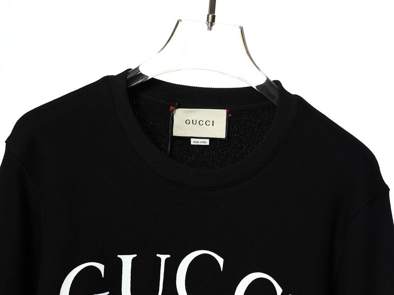 Close-up detail shot of Gucci luxury clothing with tailored silhouette