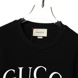 Close-up detail shot of Gucci luxury clothing with tailored silhouette