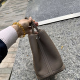 Side view of statement structured handbag