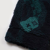 Close-up detail shot of Louis Vuitton luxury clothing with label-forward styling