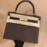Side view of classic structured handbag