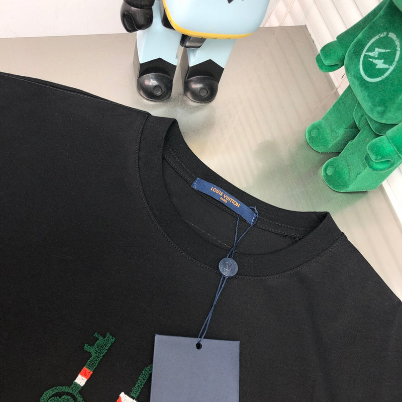 Close-up detail shot of Louis Vuitton cotton t-shirt with logo-detail design
