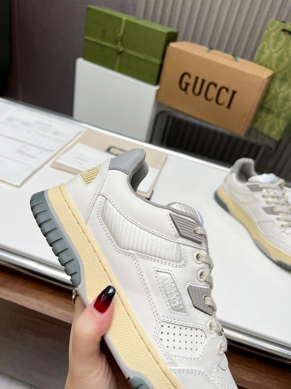 Gucci crisp white luxury sneakers view 6 retro runner design