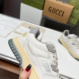 Gucci crisp white luxury sneakers view 6 retro runner design