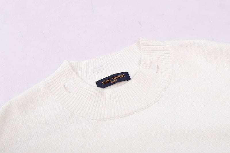 Back view of Louis Vuitton luxury clothing with label-forward styling