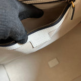 Side view of classic structured handbag